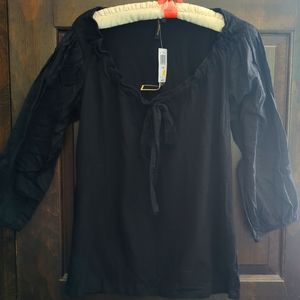 Knit body, slightly sheer sleeves